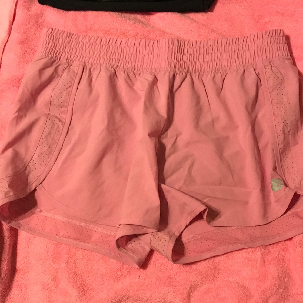 Pink New Balance running shorts, size Large.